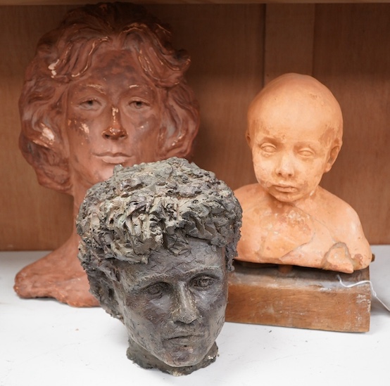 Three busts including a terracotta example of a child, tallest 42cm. Condition - poor